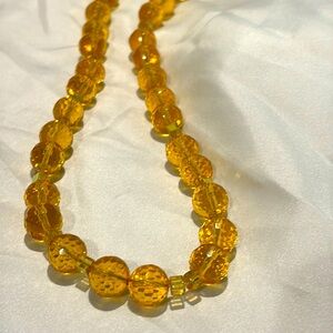 Amber glass bead necklace.